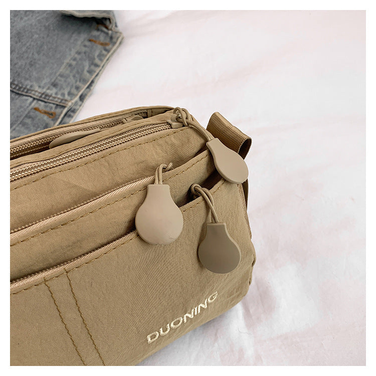 Black Women's Lightweight Nylon Crossbody Bag - Multi-Layer Shoulder Purse with Adjustable Strap for Casual Travel and Daily Use